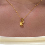 Gold Tone Mini Snowflake Bell Necklace