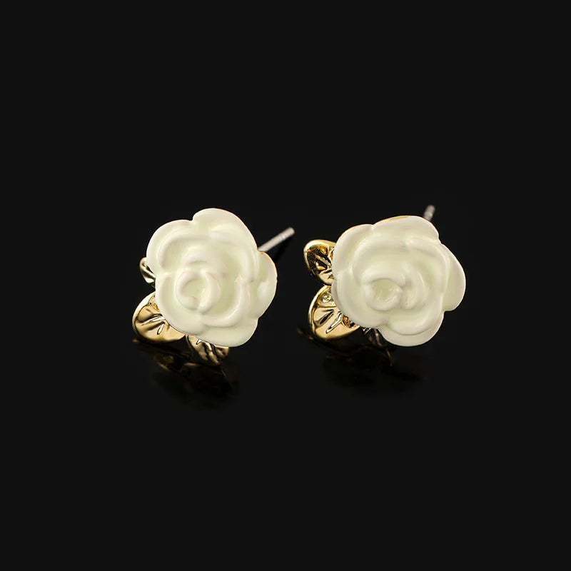 Wholesale of New Fashion Camellia Flower Mosquito Incense Plate Ear Clip Earrings with No Ear Holes Flower Ear Studs Gift